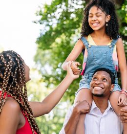 african-american-family-having-fun-spending-good-time-together-while-walking-outdoors-street (1)